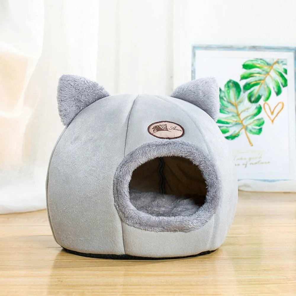 Fully enclosed cat sofa bed, a warm winter nest for indoor use, shown in a large size.