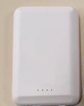 Magnetic wireless power bank in black, blue, green, pink, and white colour options showing 5000mAh capacity.