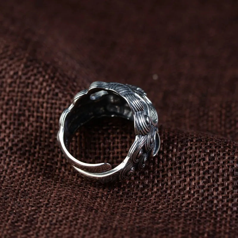 Personalised silver open ring with Jibeast pattern and diamond detailing.