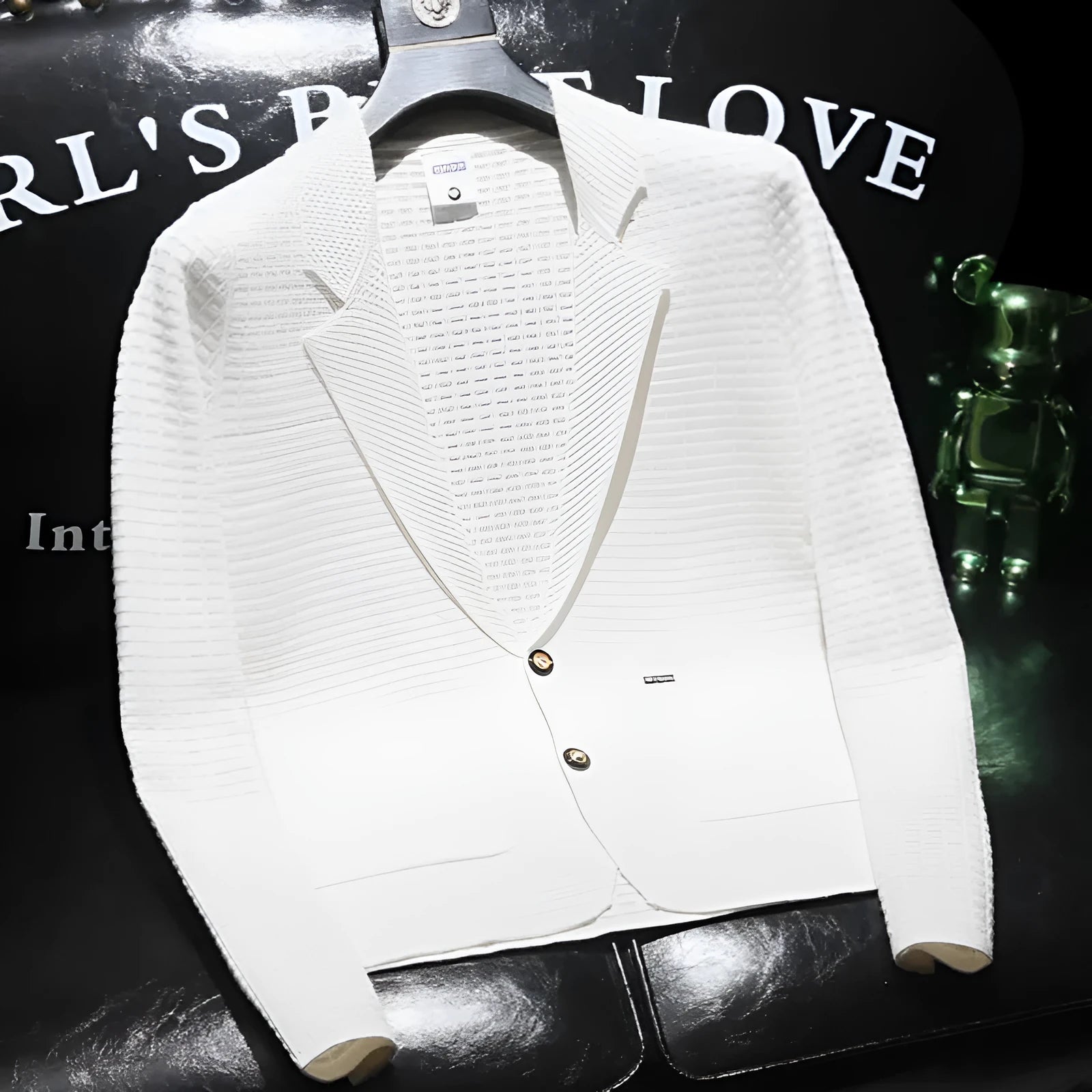 Men's white thin casual suit jacket with V-neck collar on a hanger