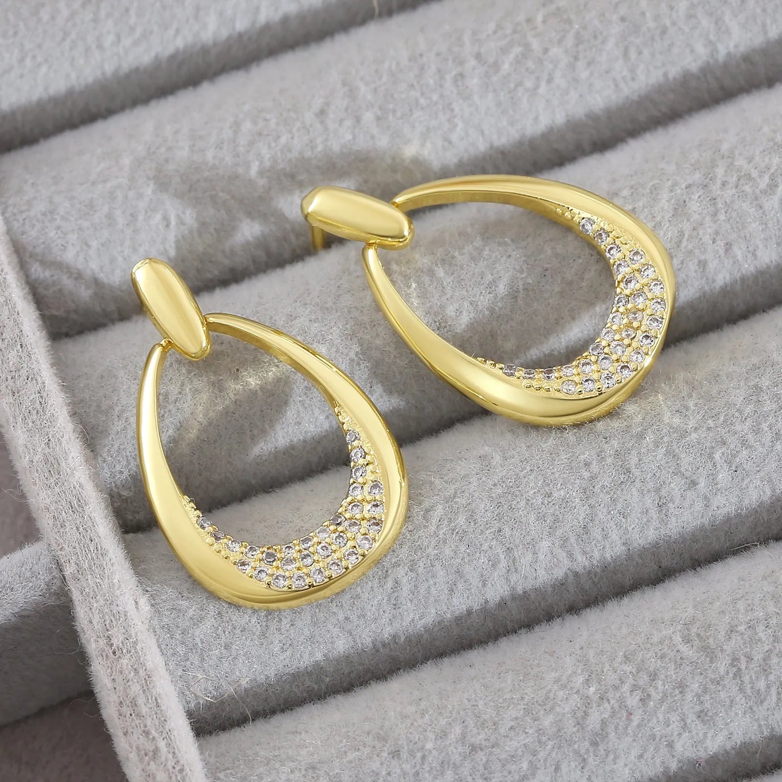 Women's yellow gold geometric drop earrings with 2.6cm length and round ring design elements