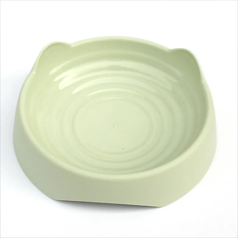 Ceramic dog slow feeder bowl with puzzle cups in blue, shown in large and small sizes.