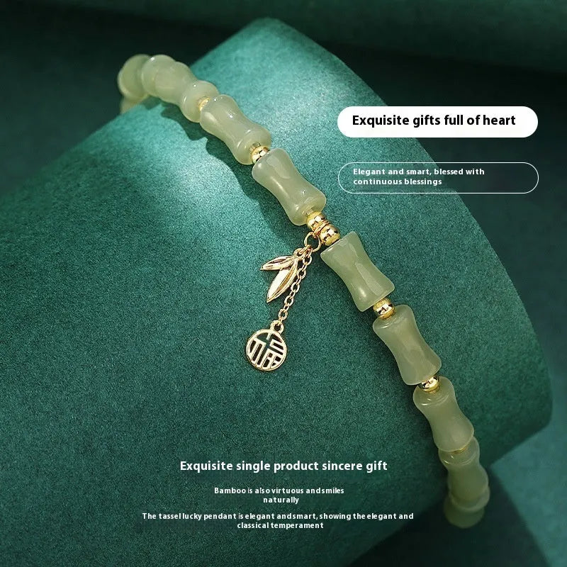Green Chinese style bamboo motif bracelet and necklace set with jade accents