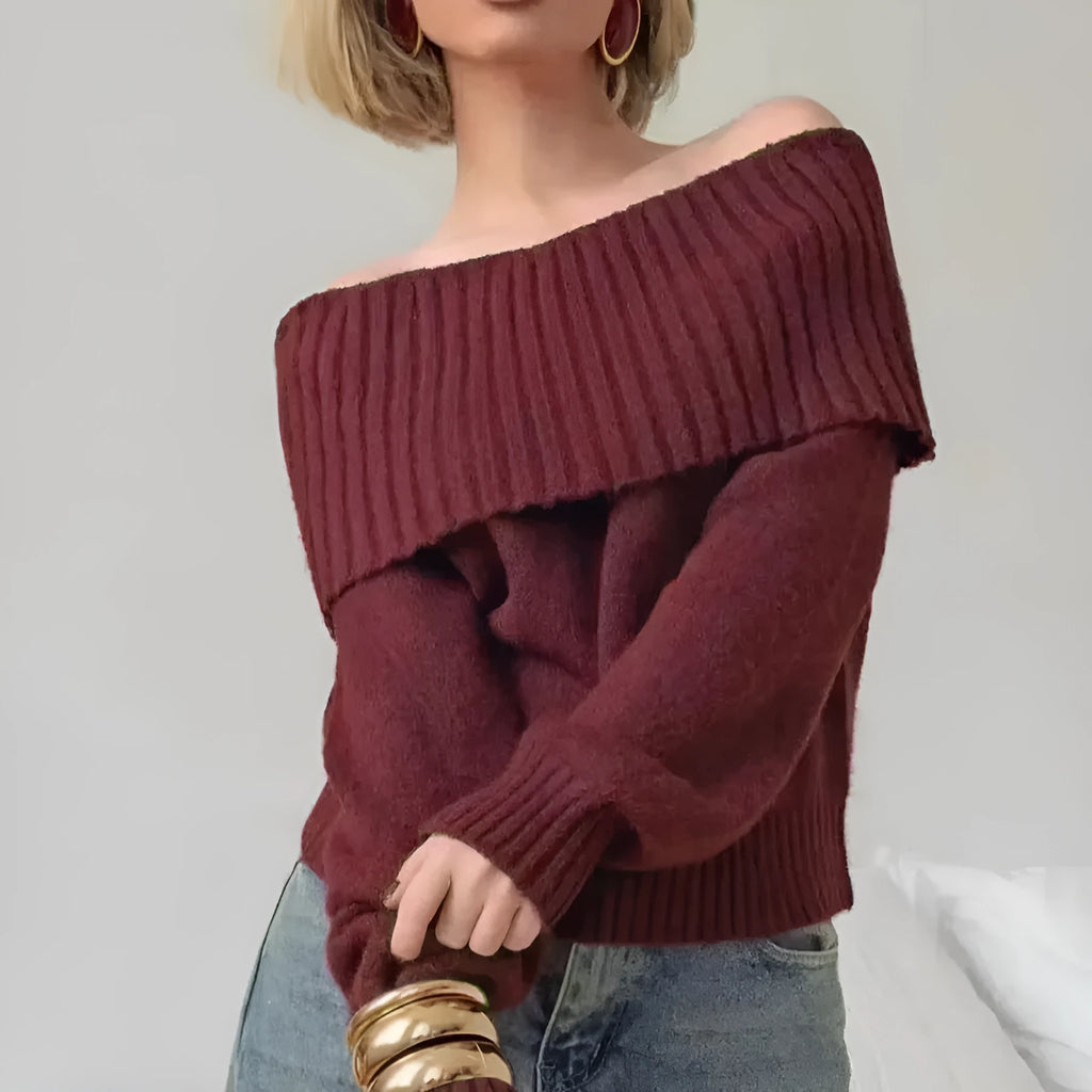 Grey off-the-shoulder pullover sweater with a textured 3D pattern on the front.