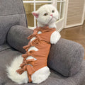 Lace-up polyester recovery clothing for a cat, shown in a choice of colours including blue, pink, and green pineapple.