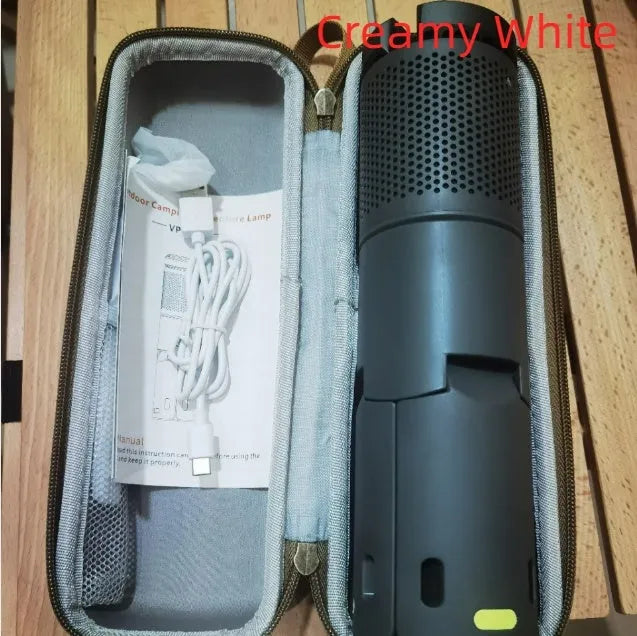 Portable LED camping light in creamy white and dark grey colours with button switch