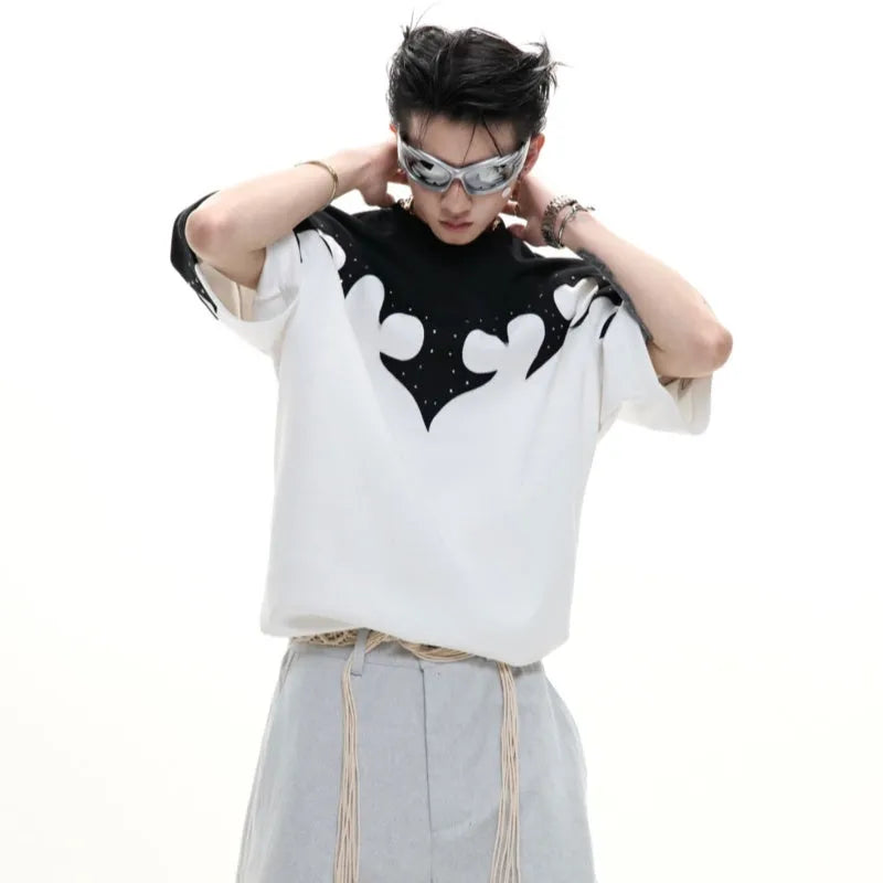 Men's grey cotton t-shirt with burnt flower embroidery and rhinestone details on the front.