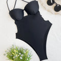 Black one-piece swimsuit for women made from spandex fabric