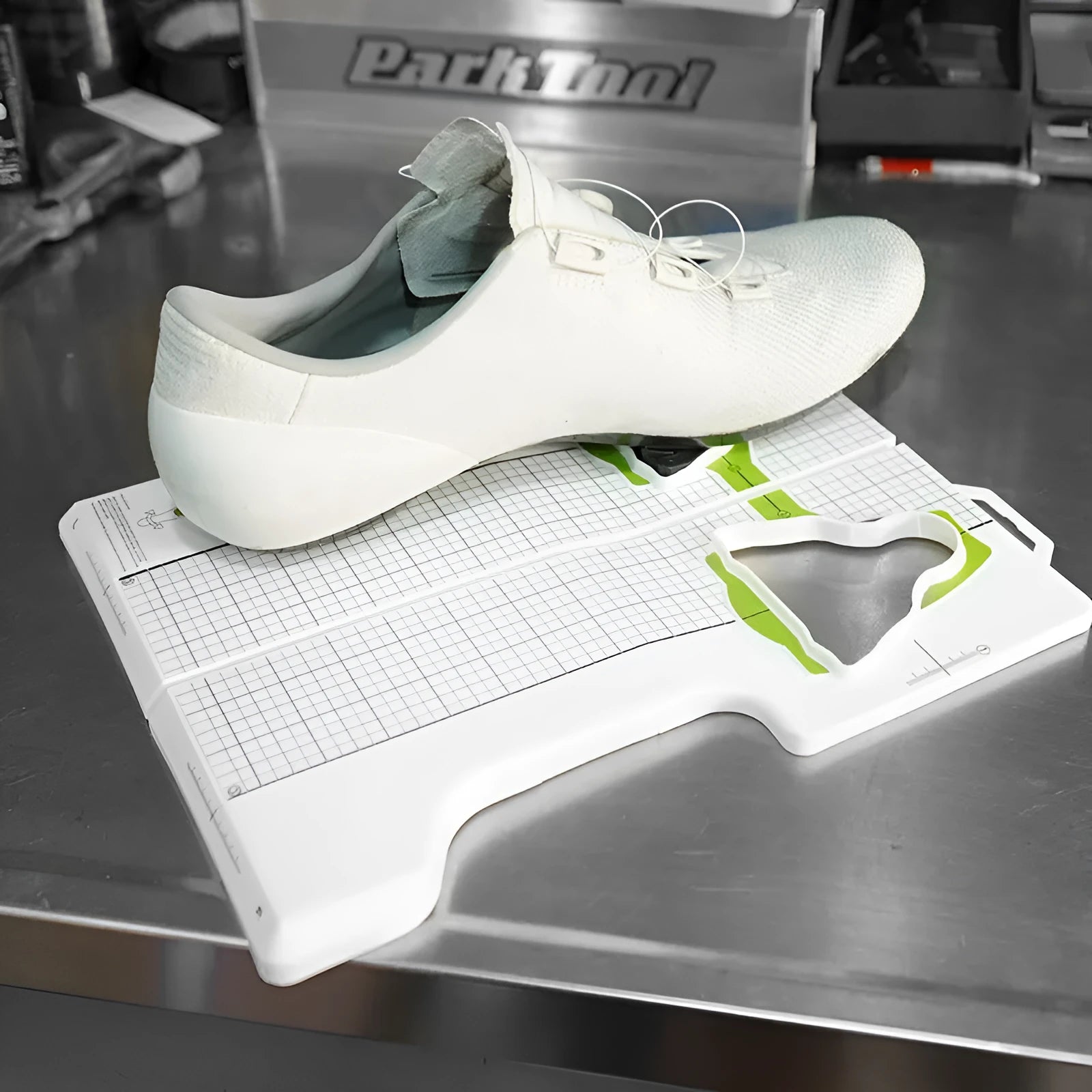 Shimano SPD-SL cleat adjustment tool with colour-coded sections for SPD and KEO models