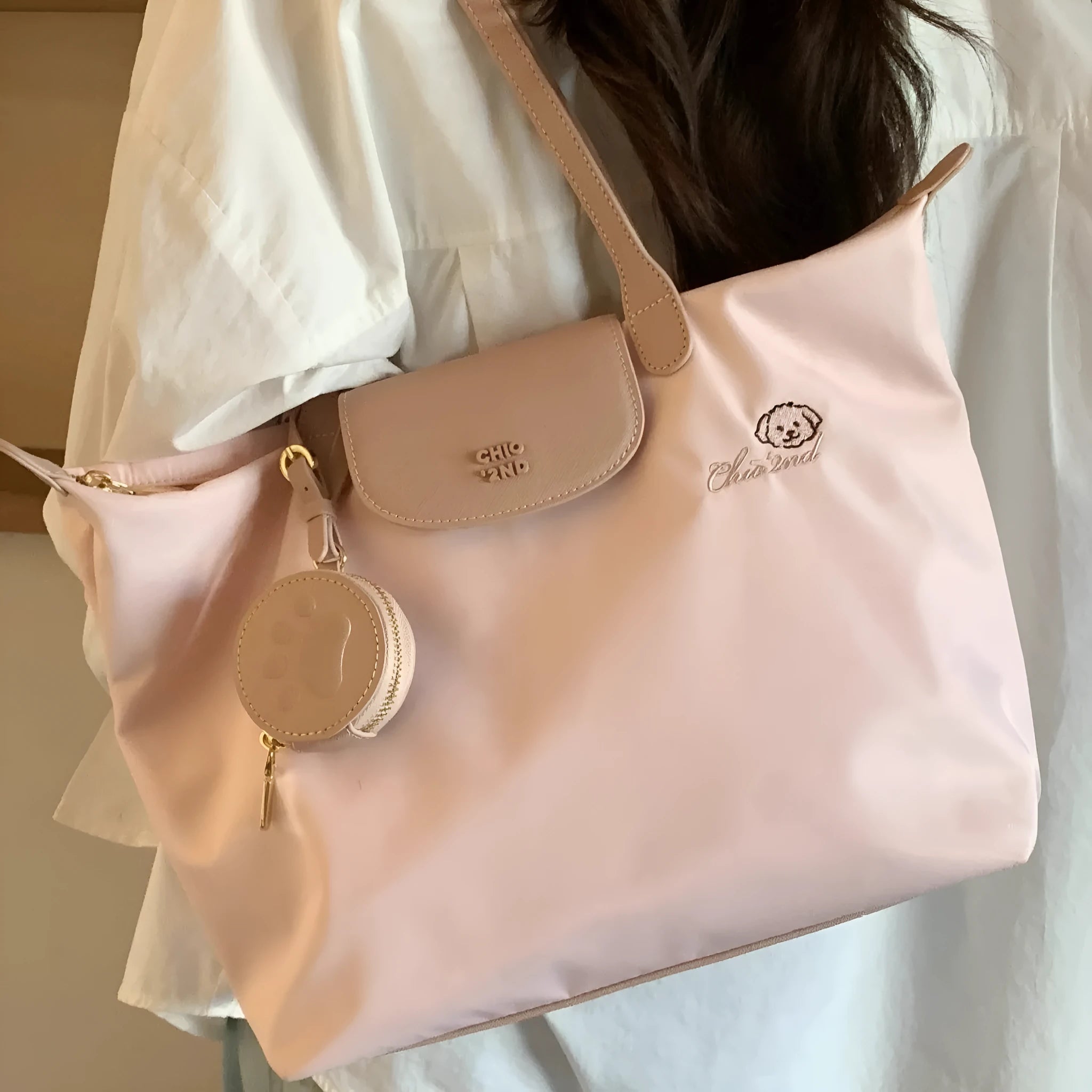 Beige Oxford cloth large capacity tote bag with shoulder strap showing horizontal square shape and sandwich pocket