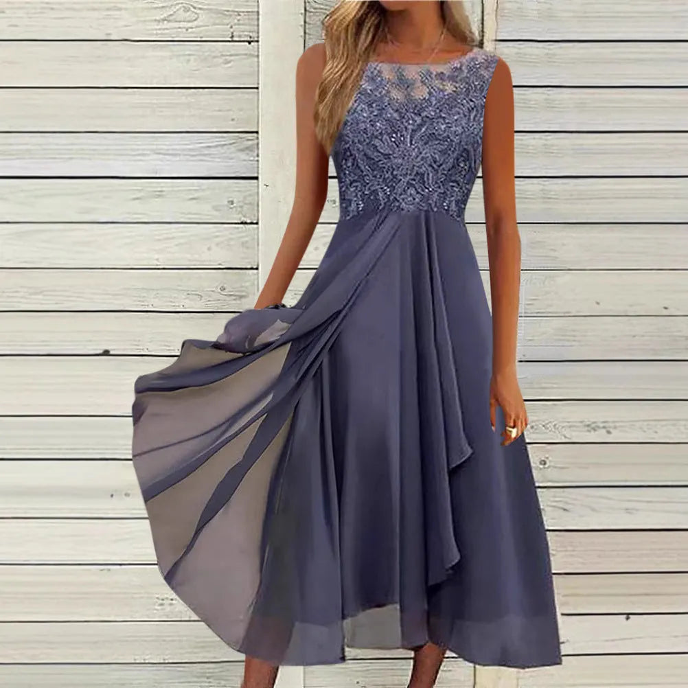 Women's sleeveless green chiffon dress with lace stitching and a mid-length skirt.