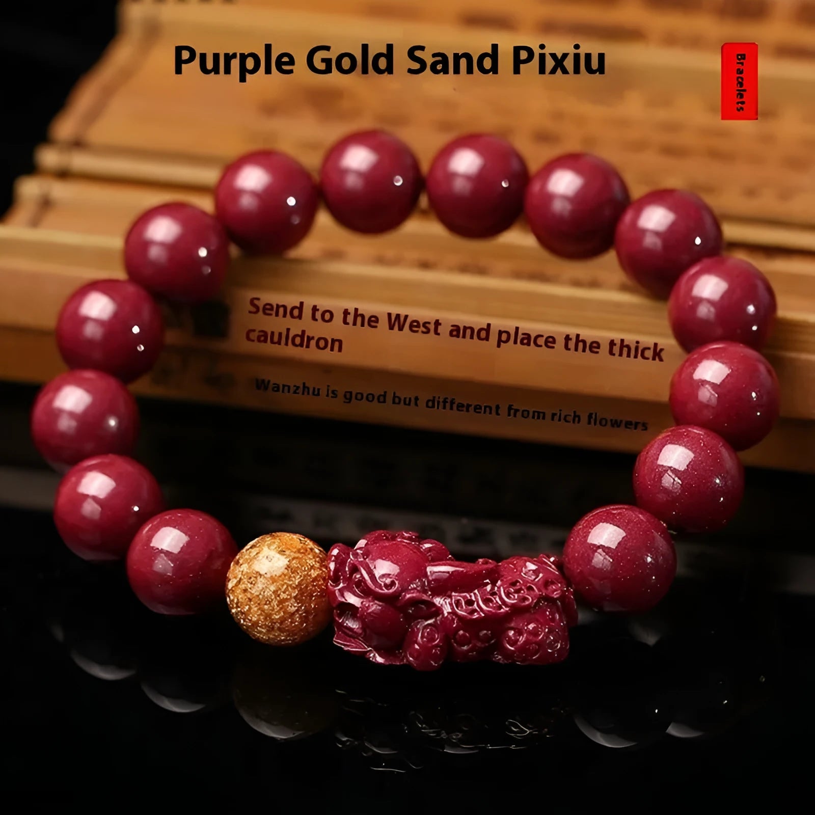 Purple gold sandstone cinnabar bracelet with totem elements on a wrist.