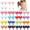40-piece set of solid-colour grosgrain ribbon baby hair bows with wrapped metal snap clips.
