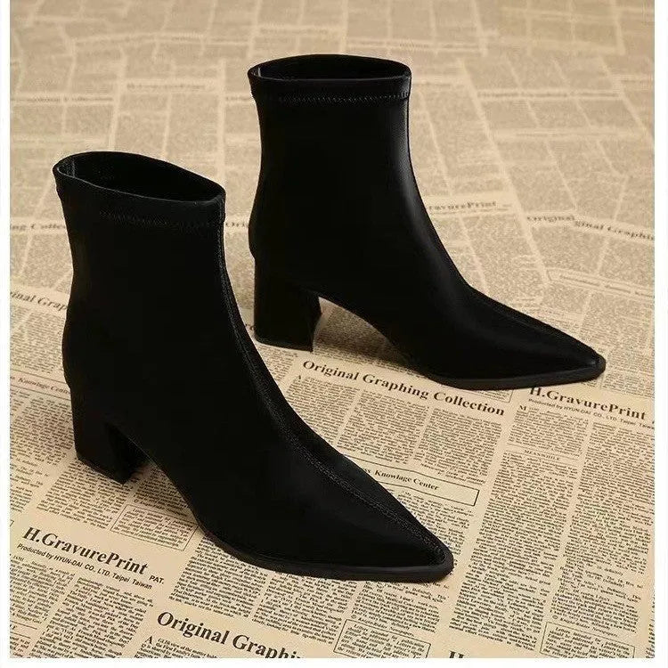 Women's pointed toe boots in stretch artificial suede with mid-heel wedge design