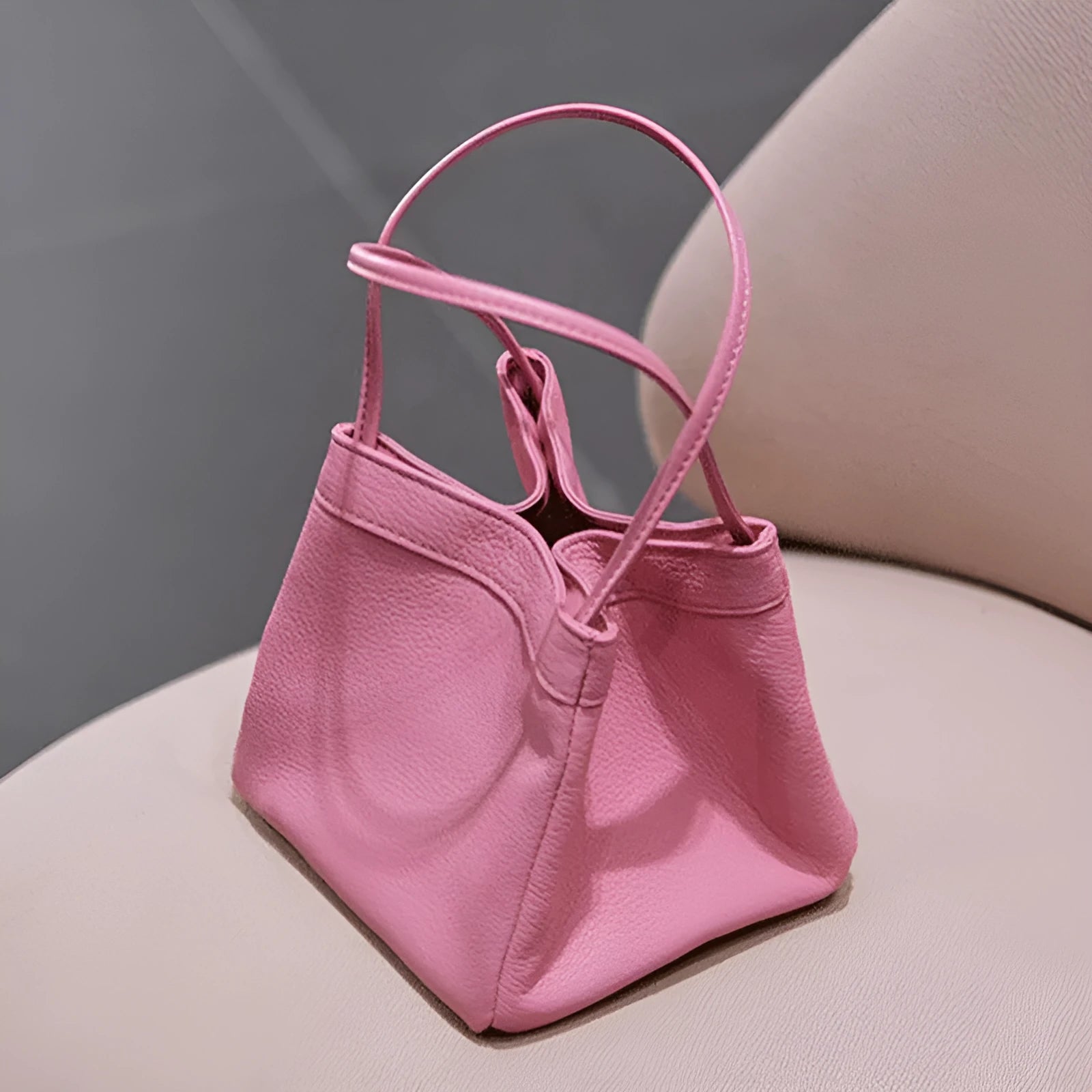 Cute small square bucket bag for women in textured PU, available in six solid colours including green and black.
