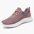 Women's low-top lace-up sneakers in black mesh with a soft PVC sole.