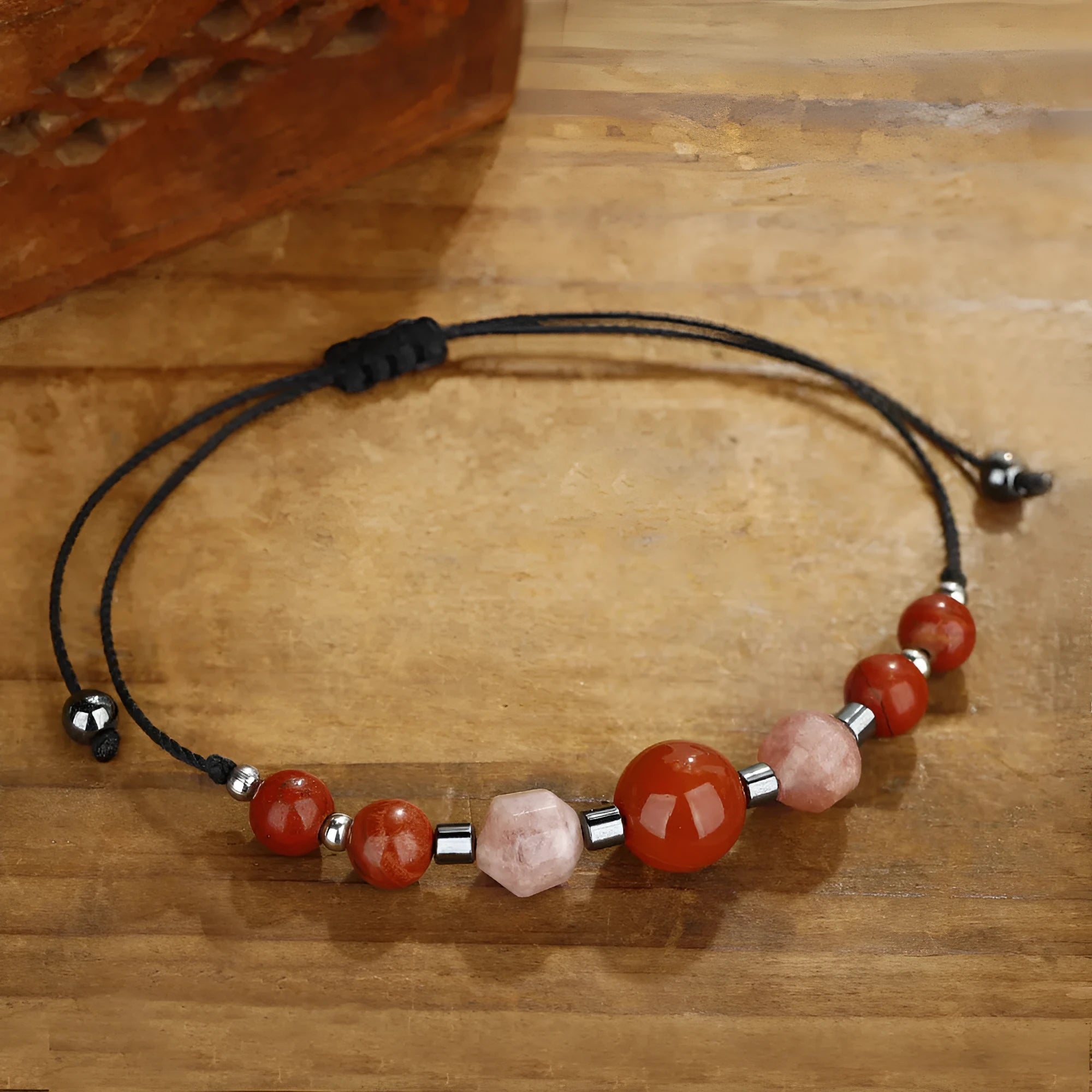 Red geometric bead crystal bracelet with sunstone, redstone and copper elements
