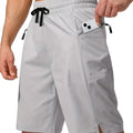 Men's solid colour quick-drying polyester beach shorts in a straight fit style.