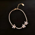 Women's copper geometric bracelet with zircon stones in quadrilateral pattern, gold colour finish
