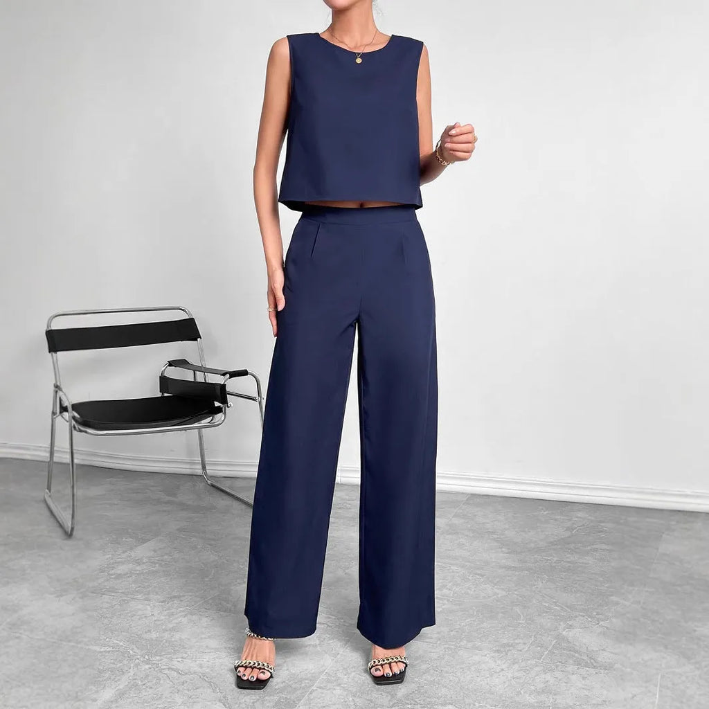 Women's red sleeveless top and wide-leg trousers co-ord set on hanger