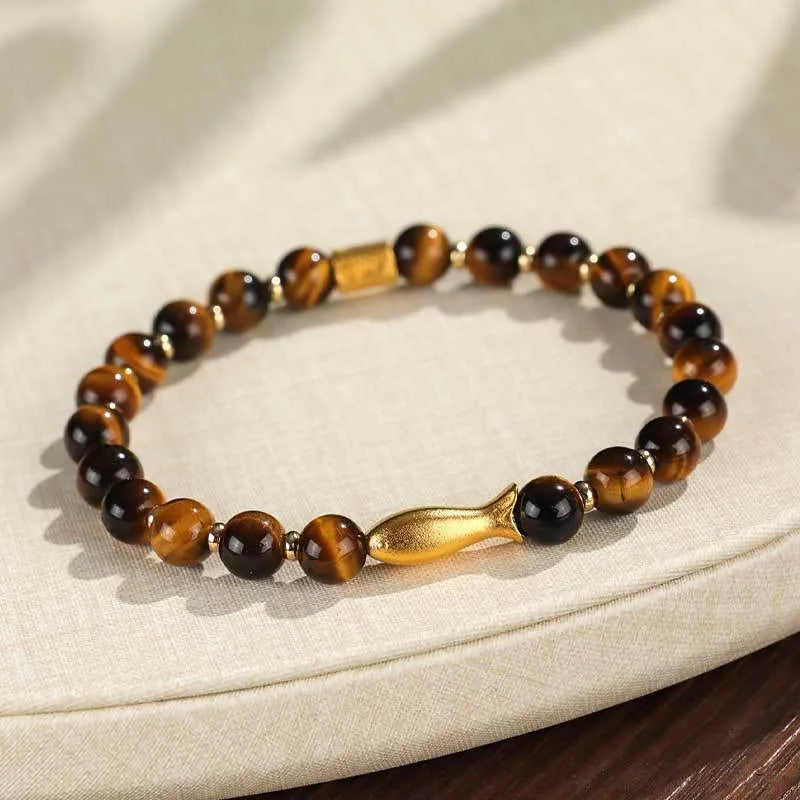 Handmade yellow tiger eye bracelet with small fish charm bead for women