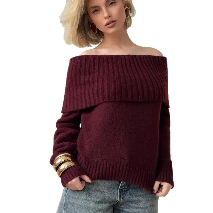 Grey off-the-shoulder pullover sweater with a textured 3D pattern on the front.