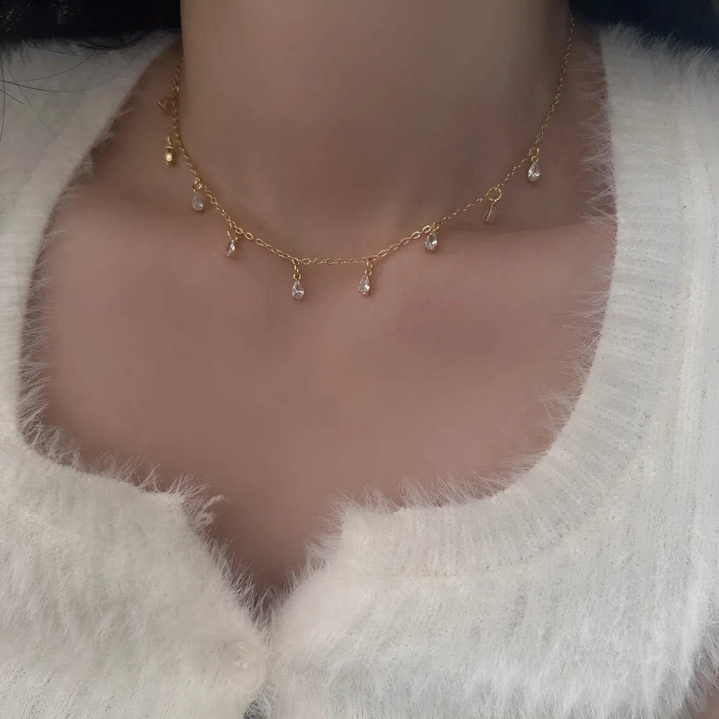 Zircon jewellery set showing necklace, earrings and anklet with geometric Korean-style design