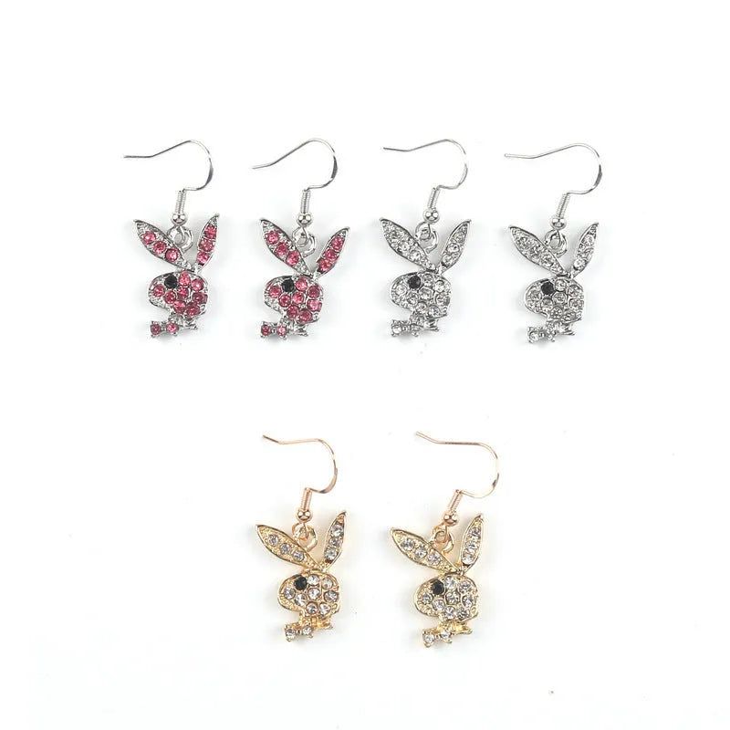 Cute cartoon rabbit stud earrings in gold, pink, and silver colours.