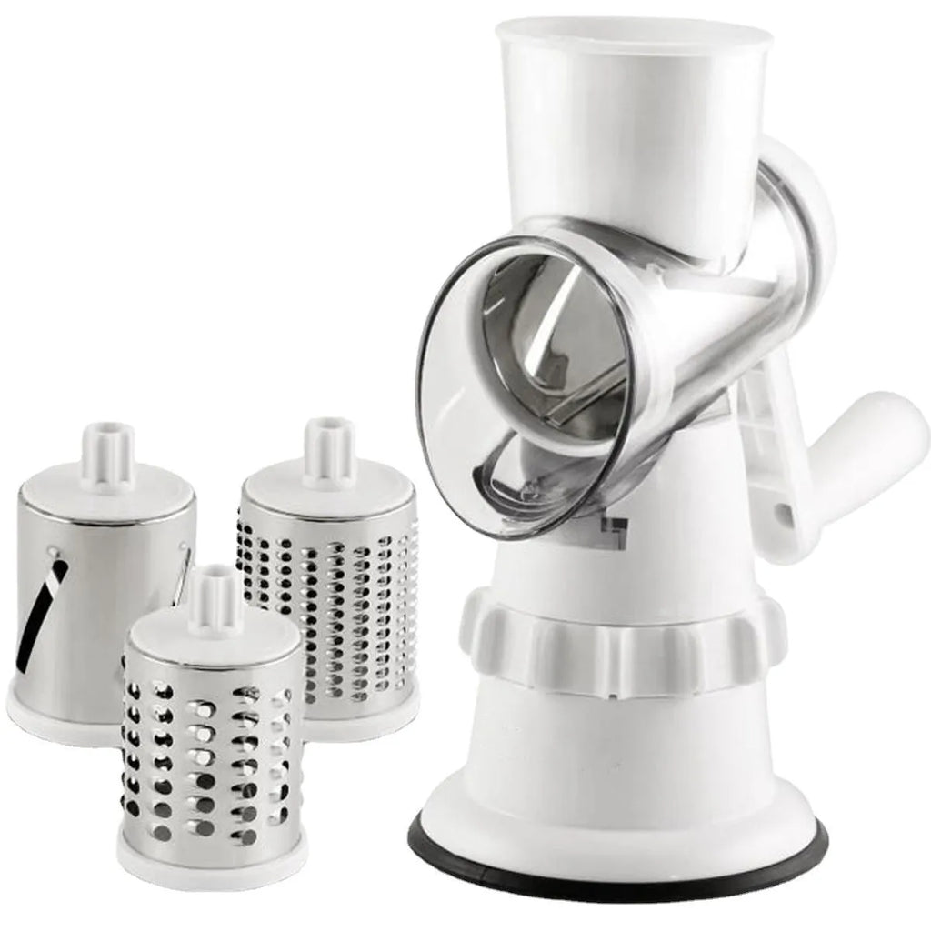 White plastic manual 3-in-1 vegetable slicer grater with stainless steel blades on a kitchen counter.