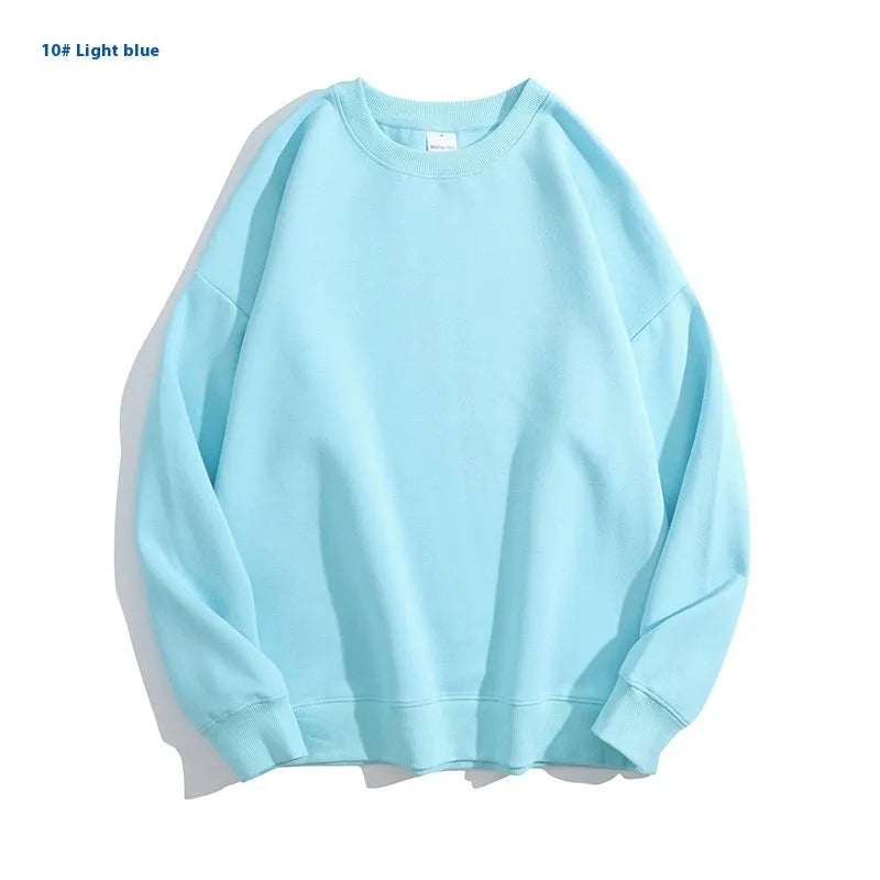 Women's loose fit cotton off shoulder sweater in a solid colour, showing round neck and long sleeves.