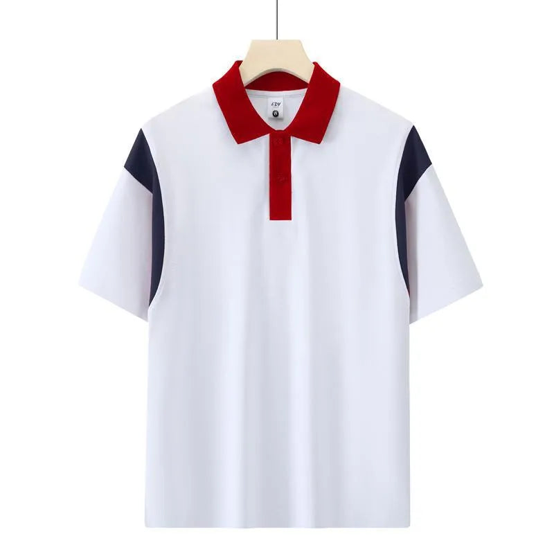 Man wearing a dark green loose-fit short sleeve cotton shirt with raglan sleeves.