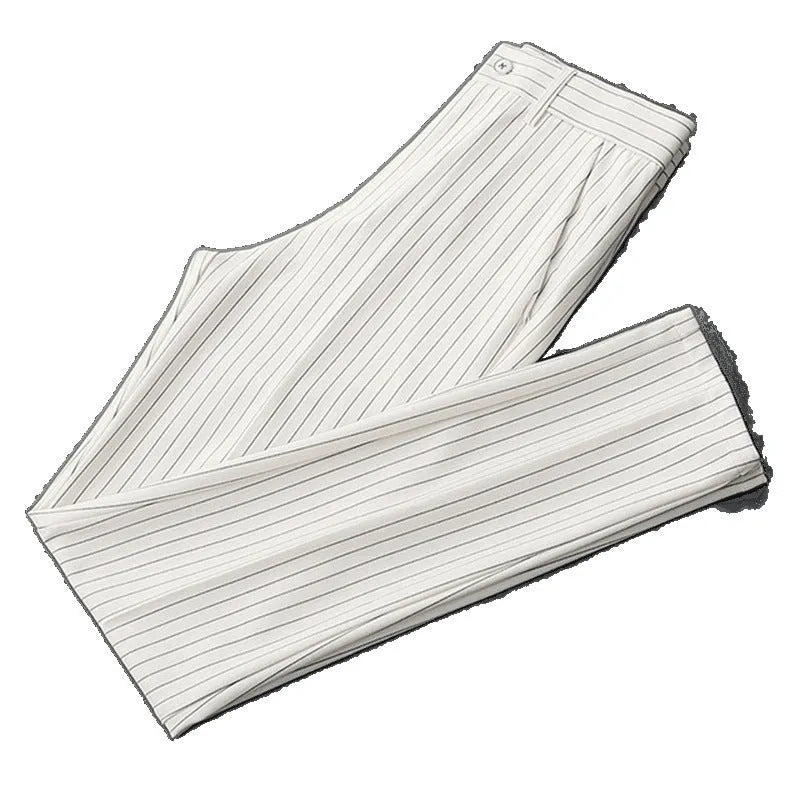 Men's loose-fitting striped casual trousers in black and white colours showing trousers and crop jeans styles