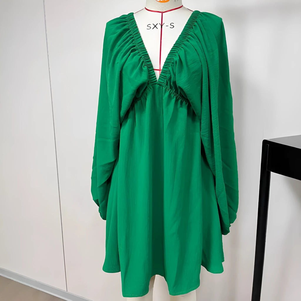 Women's apricot V-neck midi dress with long puff sleeves and a flounced skirt.