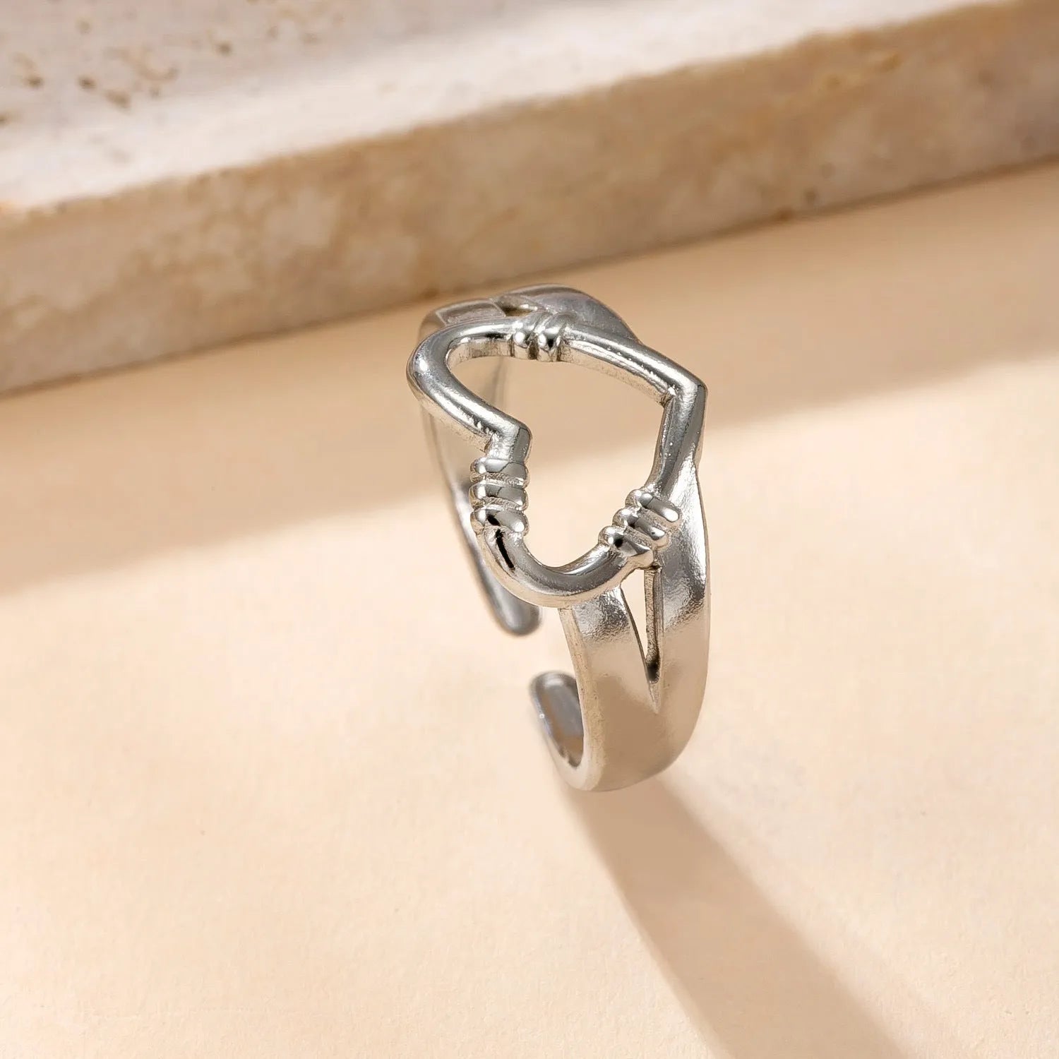 Stainless steel open ring with hollow star and moon design, electroplating finish, unisex average size.
