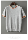 Men's round neck short sleeve pure wool sweater in black, shown on a hanger.