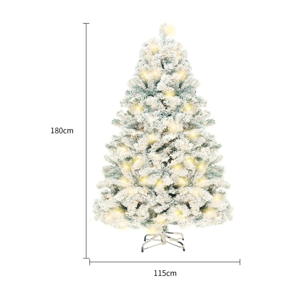 Green and white artificial PVC Christmas tree with snow effect and metal stand.
