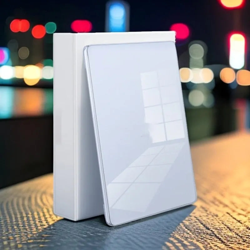 Transparent plastic protective shell for MacBook Air and Pro laptop on a table.