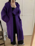 Loose grey hooded cardigan coat for women with raglan sleeves, shown open as an oversized layer.