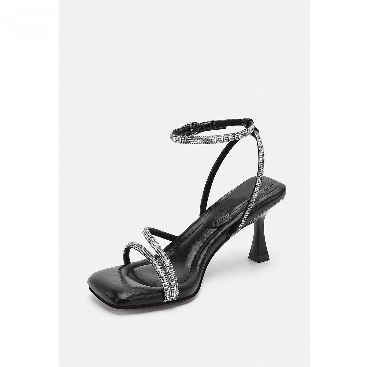 Women's silver rhinestone ankle-strap sandals with a square toe and buckle fastening.