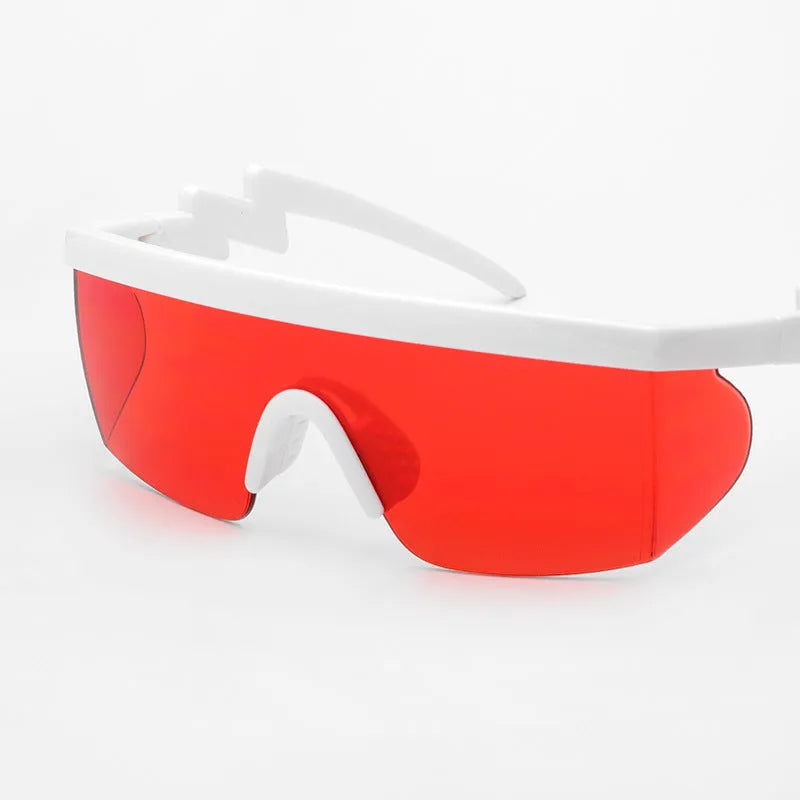 Sports sunglasses with curved foot piece, UV400 protection, and colourful film lenses in white frame