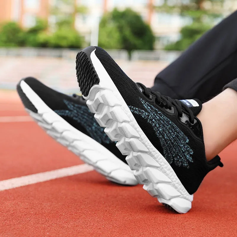 Women's black and white running shoes with cross strap detail and MD shock absorption sole
