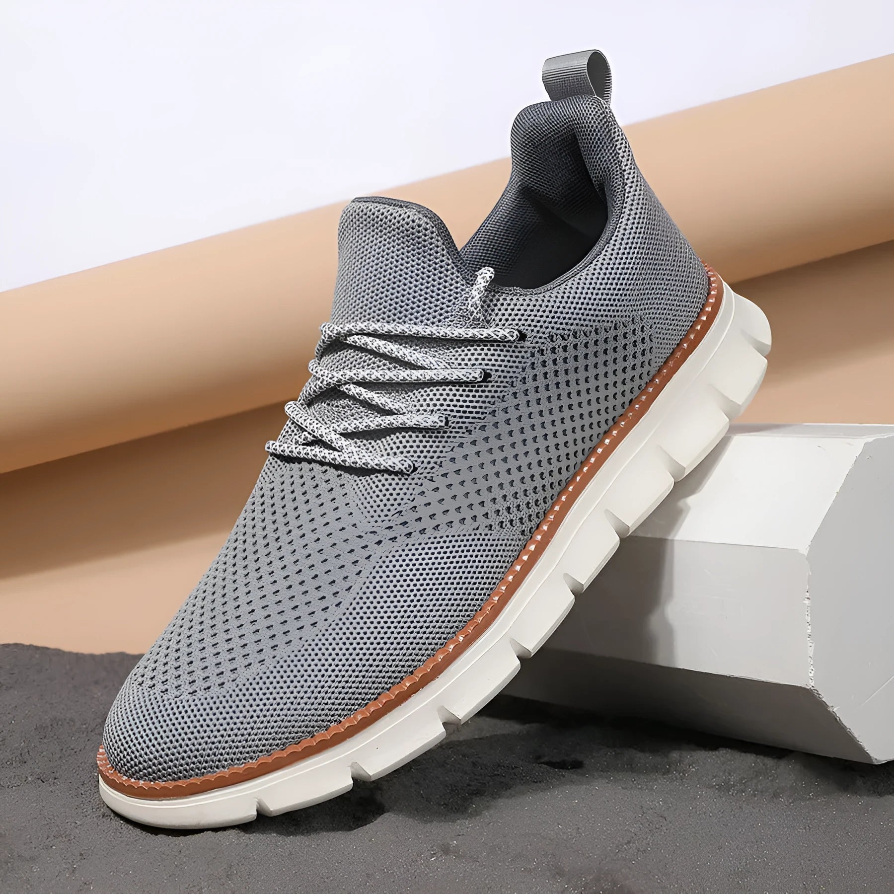 Men's casual sneaker with mesh upper in black or grey colour with round toe design