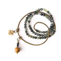 Multi-layered natural crystal ethnic style bracelet for children showing layered design