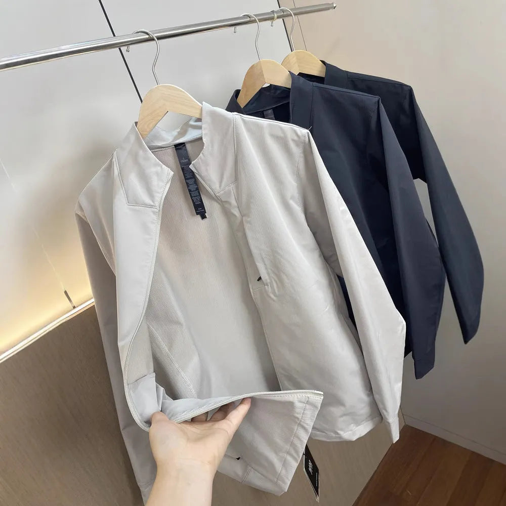 Men's stand collar casual jacket in polyester available in black, dark blue, and milky white