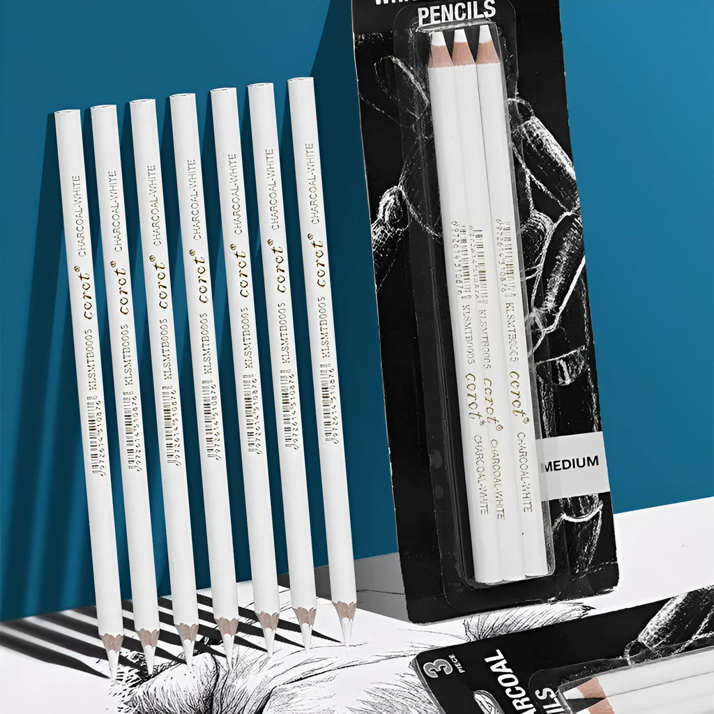 Three white charcoal sketching pencils with wooden casings and a visible refillable brush tip.