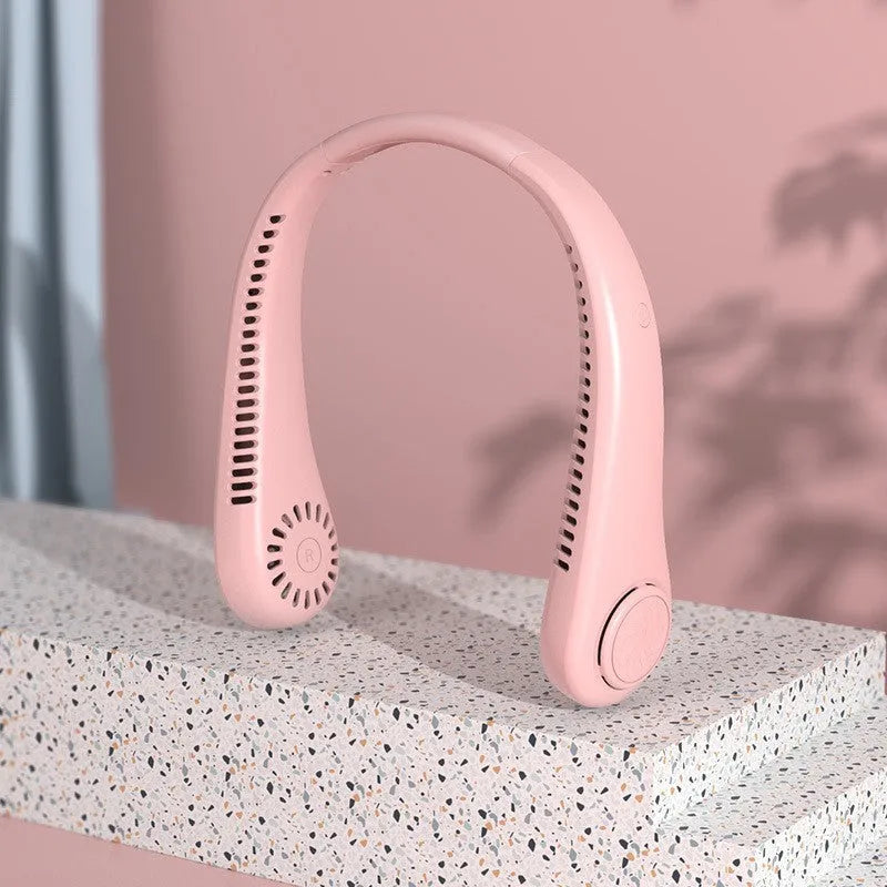 White portable bladeless neck fan worn around the neck with a USB charging cable.