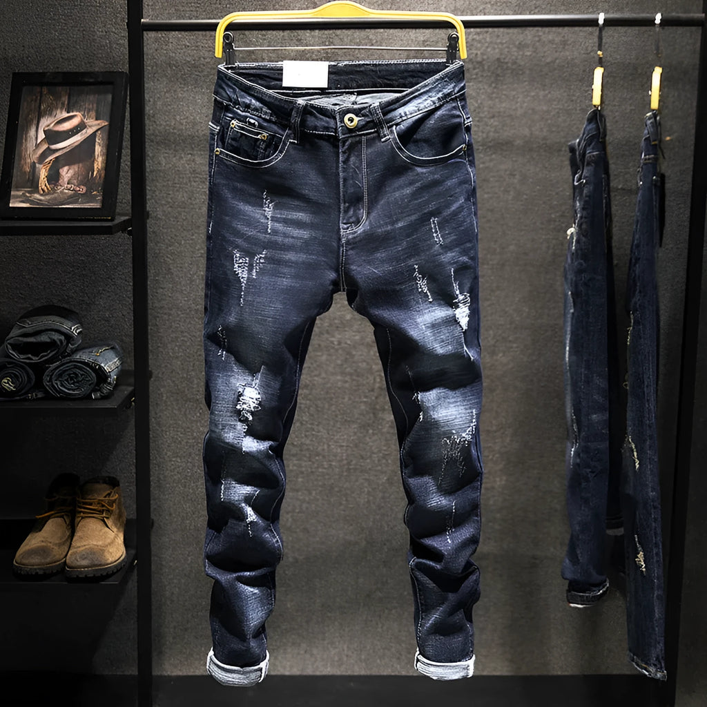 Men's slim-fitting skinny jeans in dark blue denim with a mid-waist design.