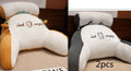 Triangle-shaped fluffy reading cushion on a chair, showing embroidered husky design and detachable cover.