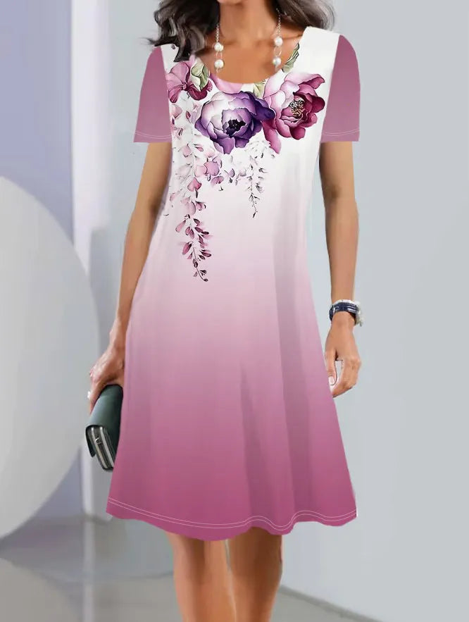 Light blue floral print mid-length A-line dress with short sleeves and a round neck.