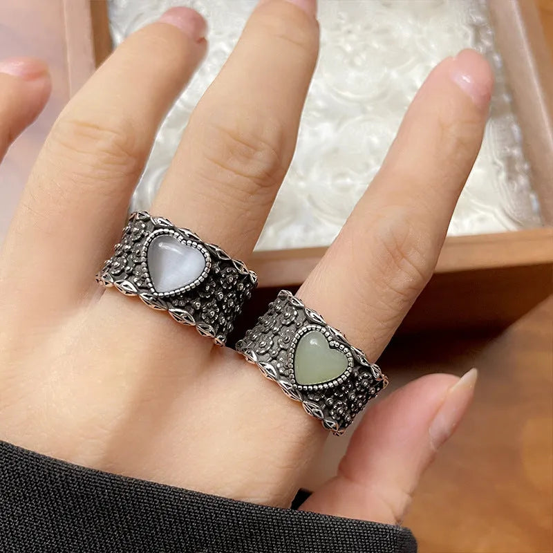 Retro style adjustable silver plated ring with heart design in white or green colour